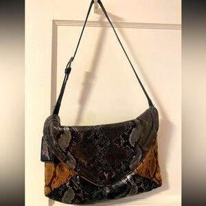 NWOT Carlos Santana envelope bag